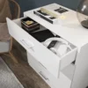 Close-up of drawer front with smooth white finish