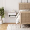Close-up of boho modern nightstand in a compact bedroom