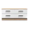White and Oak 4 Drawer Storage Unit in a modern bedroom setting
